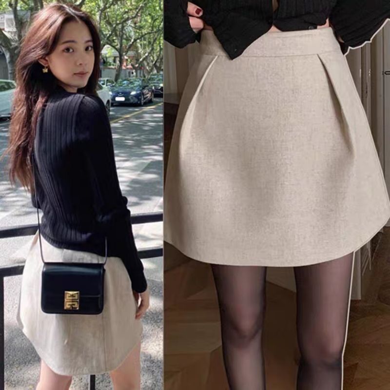 Set chân váy dạ xòe và áo len đen