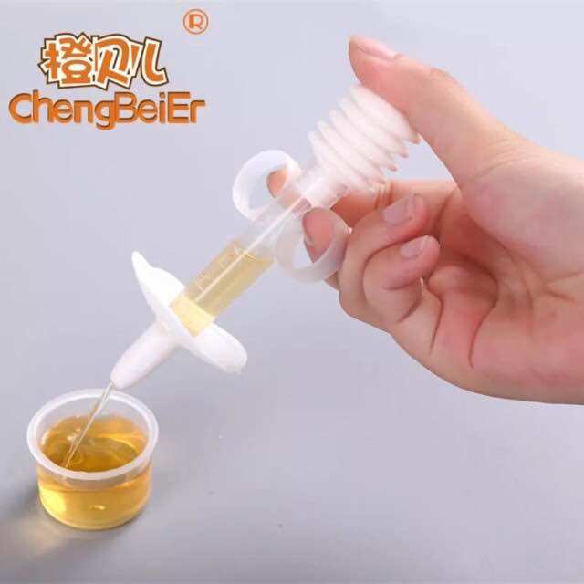Dụng cụ cho bé uống thuoc uống sữa an toàn