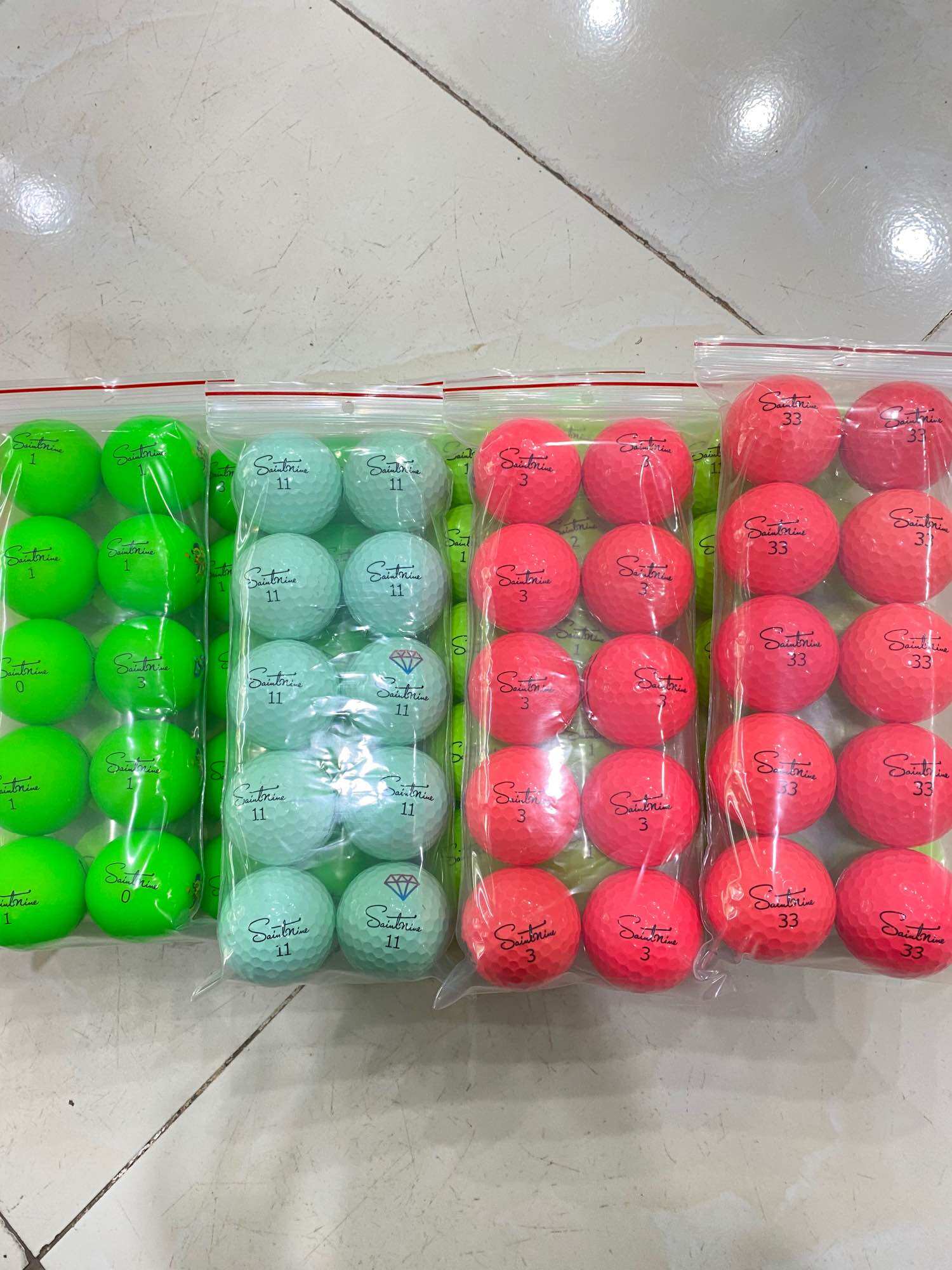 Bóng golf Saintnine màu độ mới 98% (10quả)