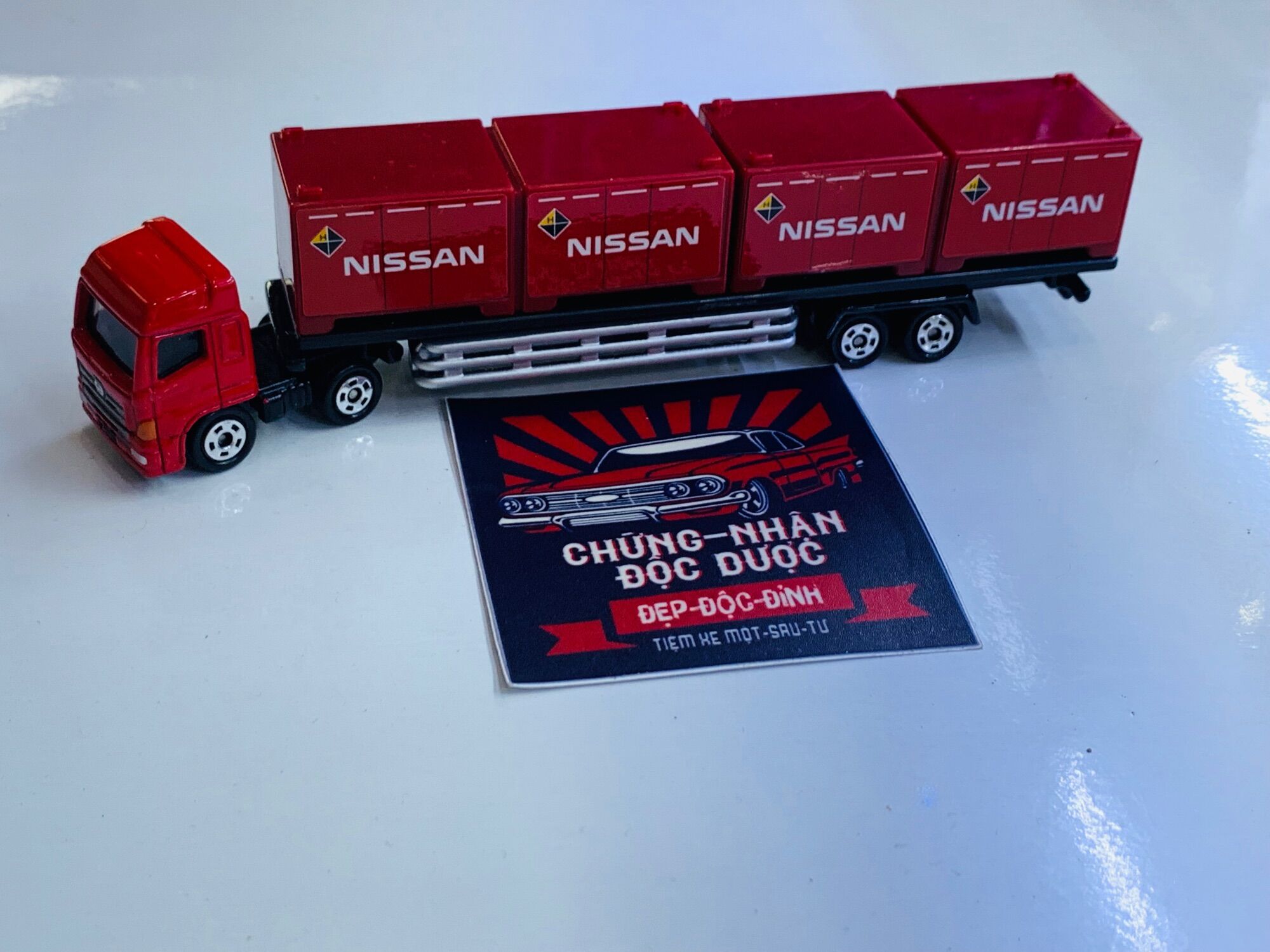 Hobby Store xe mô hình Tomica Long Hino Profia Trailer / Nissan Container