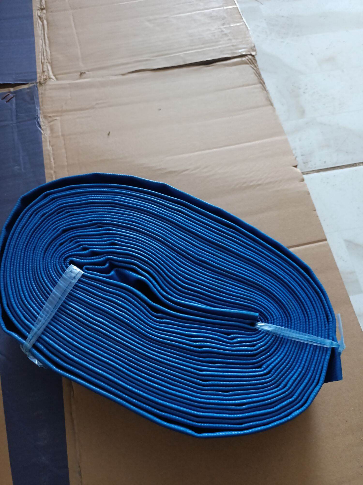 Ống bơm nước vải bạt phi 50 và phi 76 dài 20m