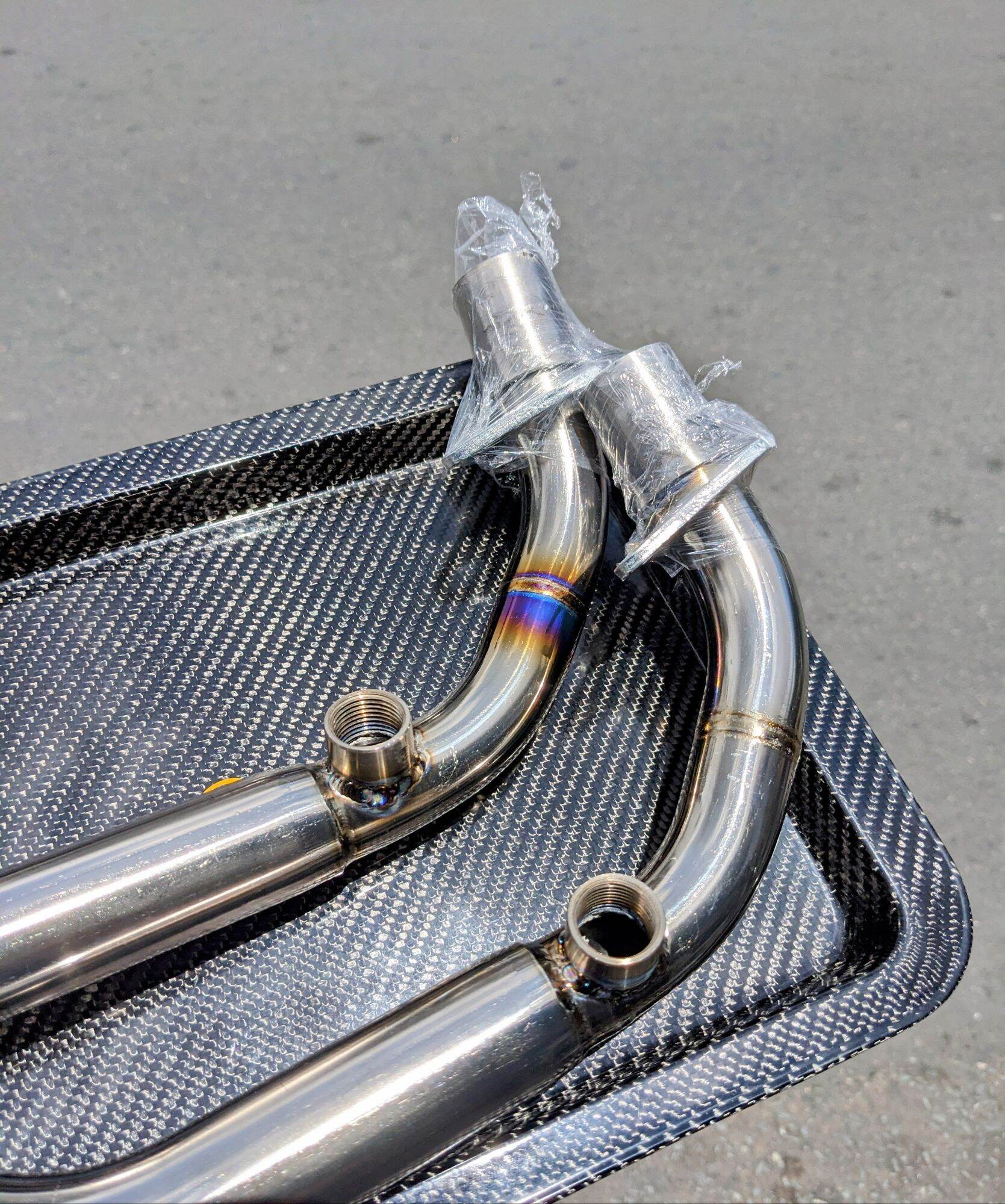 Cổ Titan Vespa Sprint cho pô Akrapovic, Hex, PR2...