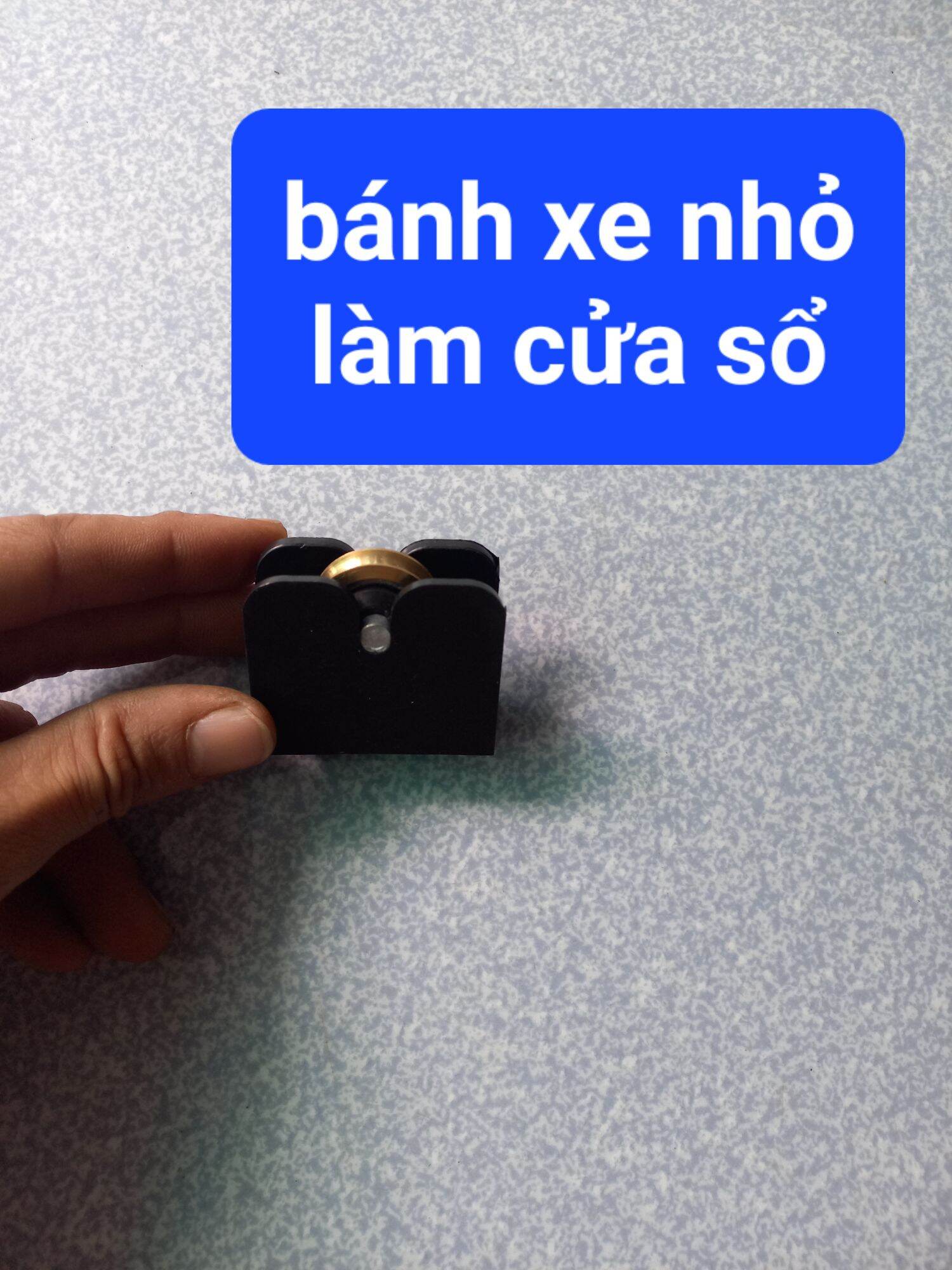 bánh xe lùa cửa nhôm