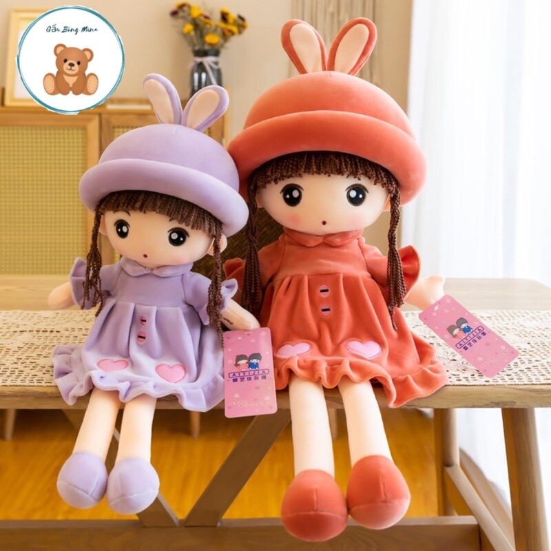 Gấu bông búp bê mặc váy cho bé gái