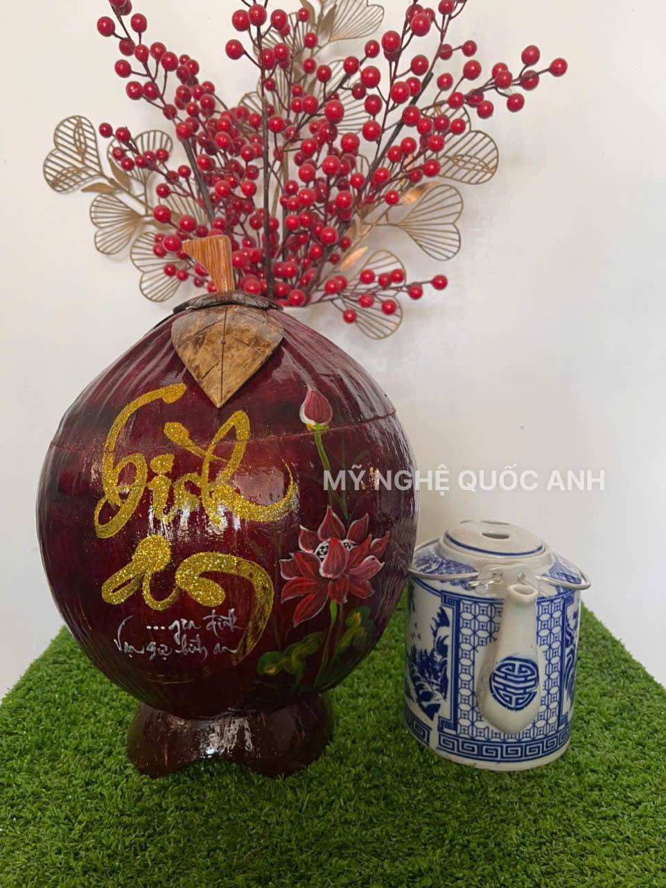 Vỏ dừa ủ ấm trà giử nhiệt vẽ thư pháp
