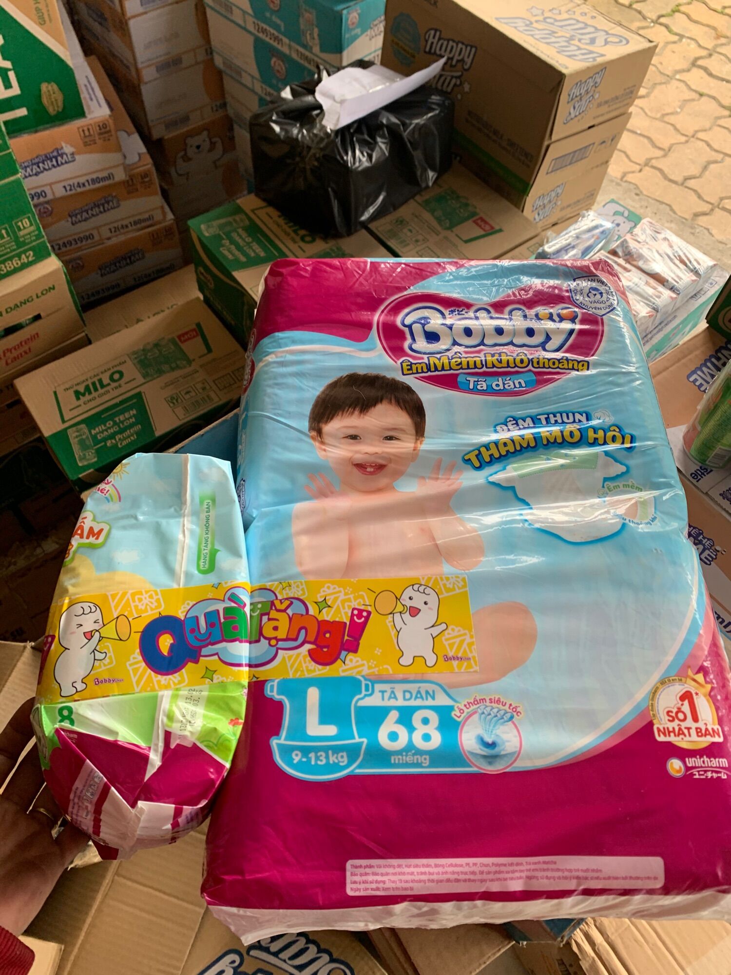 Bỉm - Tã dán Bobby size L 68 miếng tặng thêm 8 miếng(cho bé 9 - 13kg)Date 2025