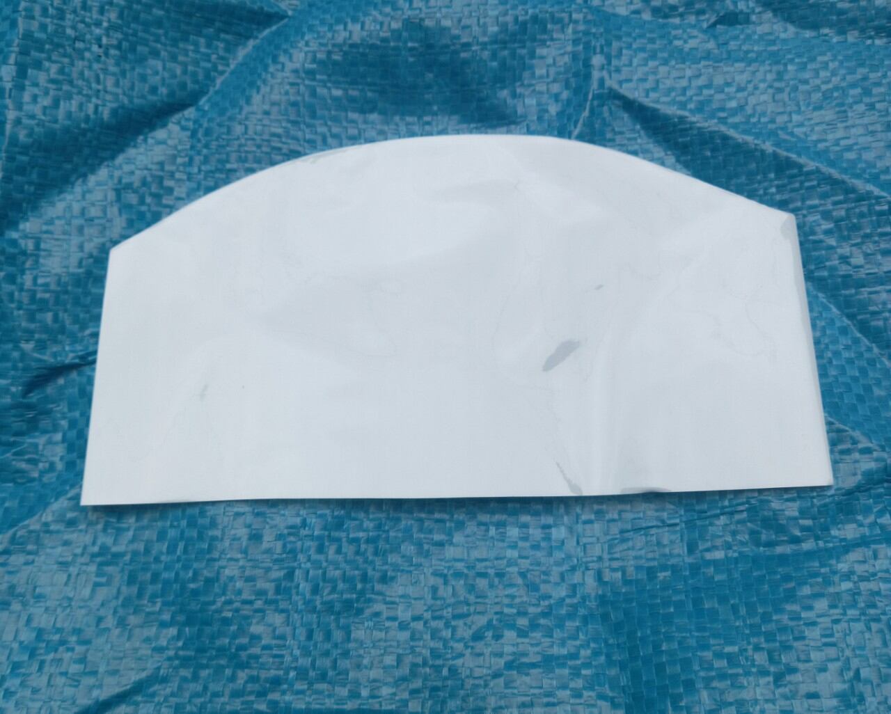 Màng co nắp bình nước lớn phi 110.500g.Màu sữa