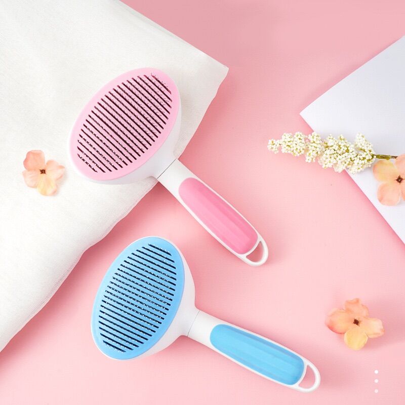 Lược chải lông chó mèo có nút bấm
