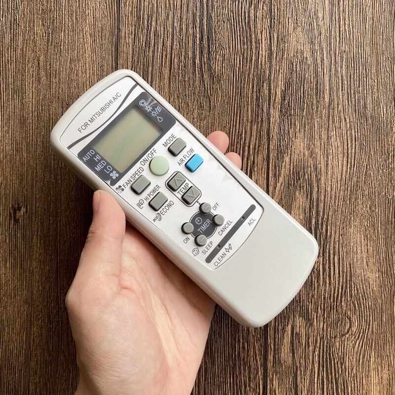 REMOTE máy lạnh MITSUBISHI thường xám ( tặng pin )