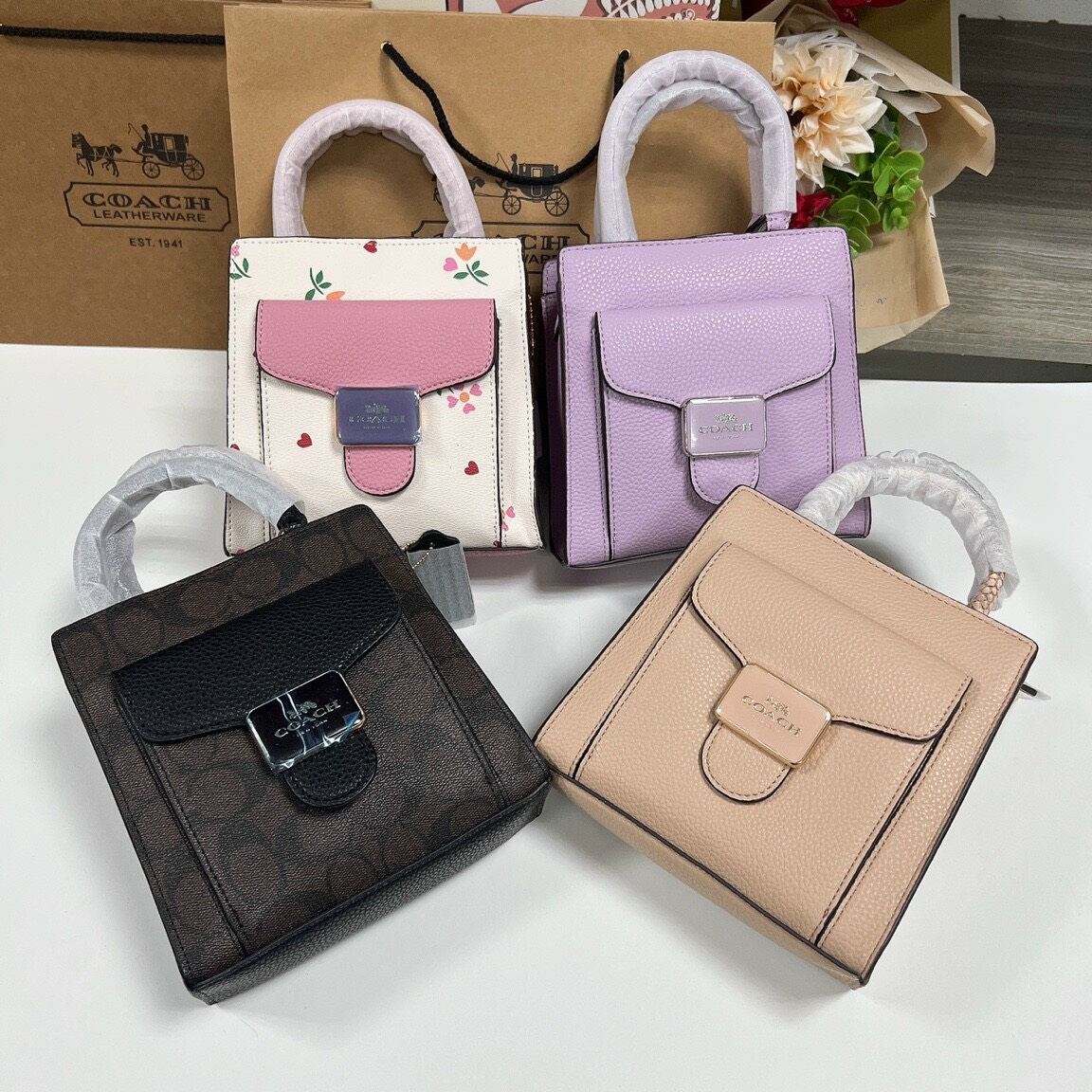 Túi Coa**ch Mini Pepper da thật siêu sang