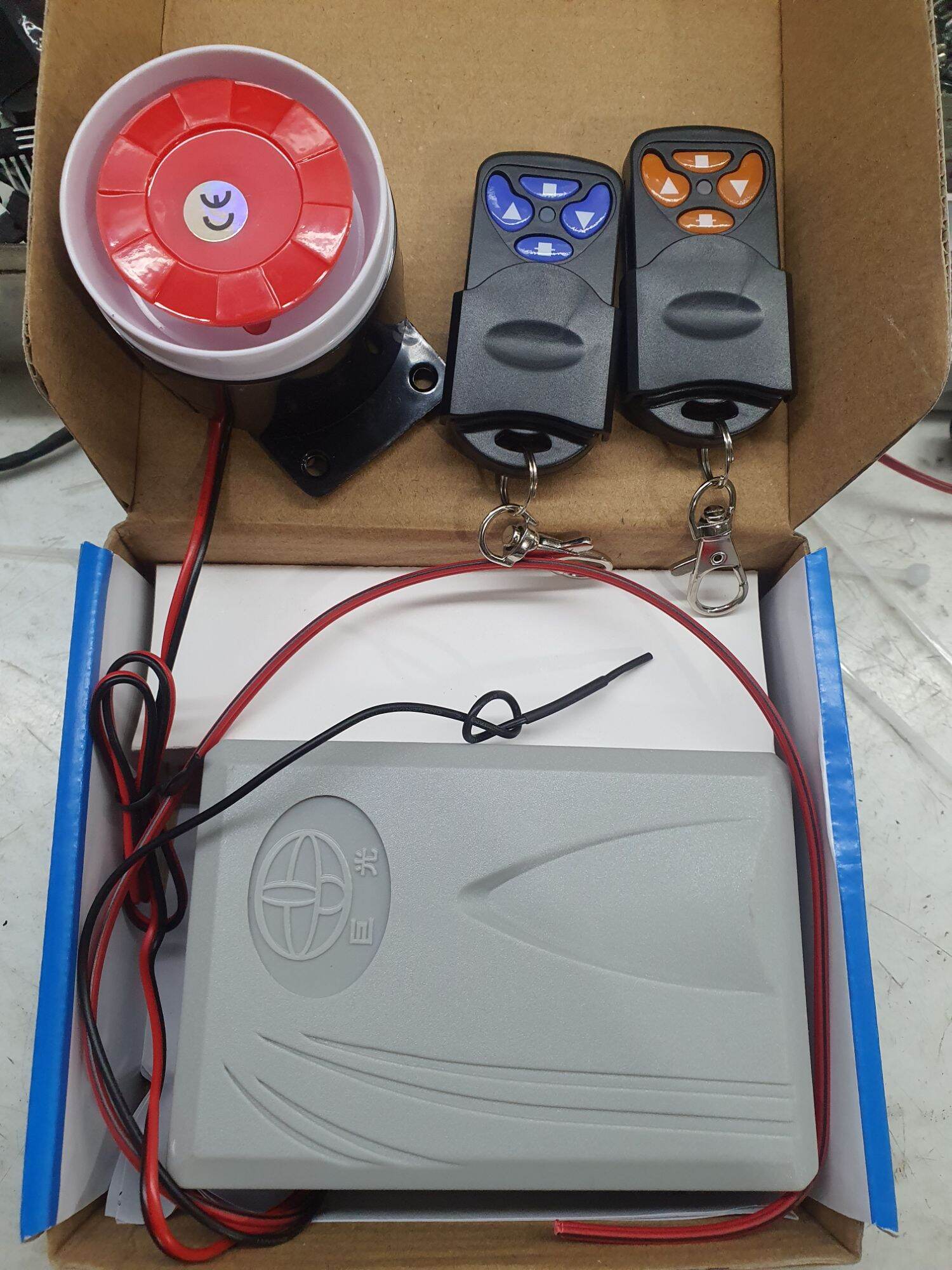 Bộ điều khiển cửa cuốn JG 303 có tự dừng trong rày và có còi hú.