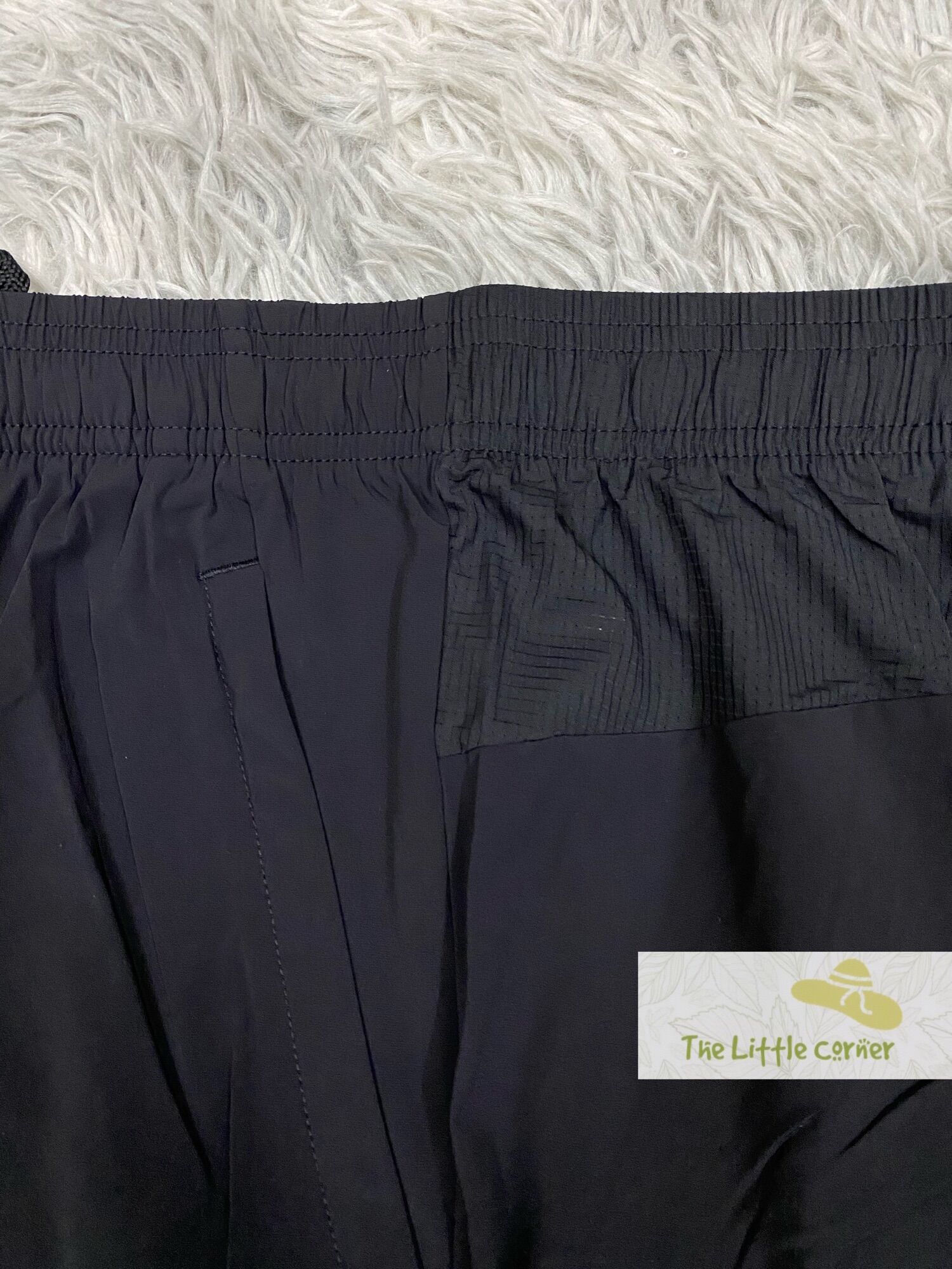 Quần short gió nam Xtep 979229975041