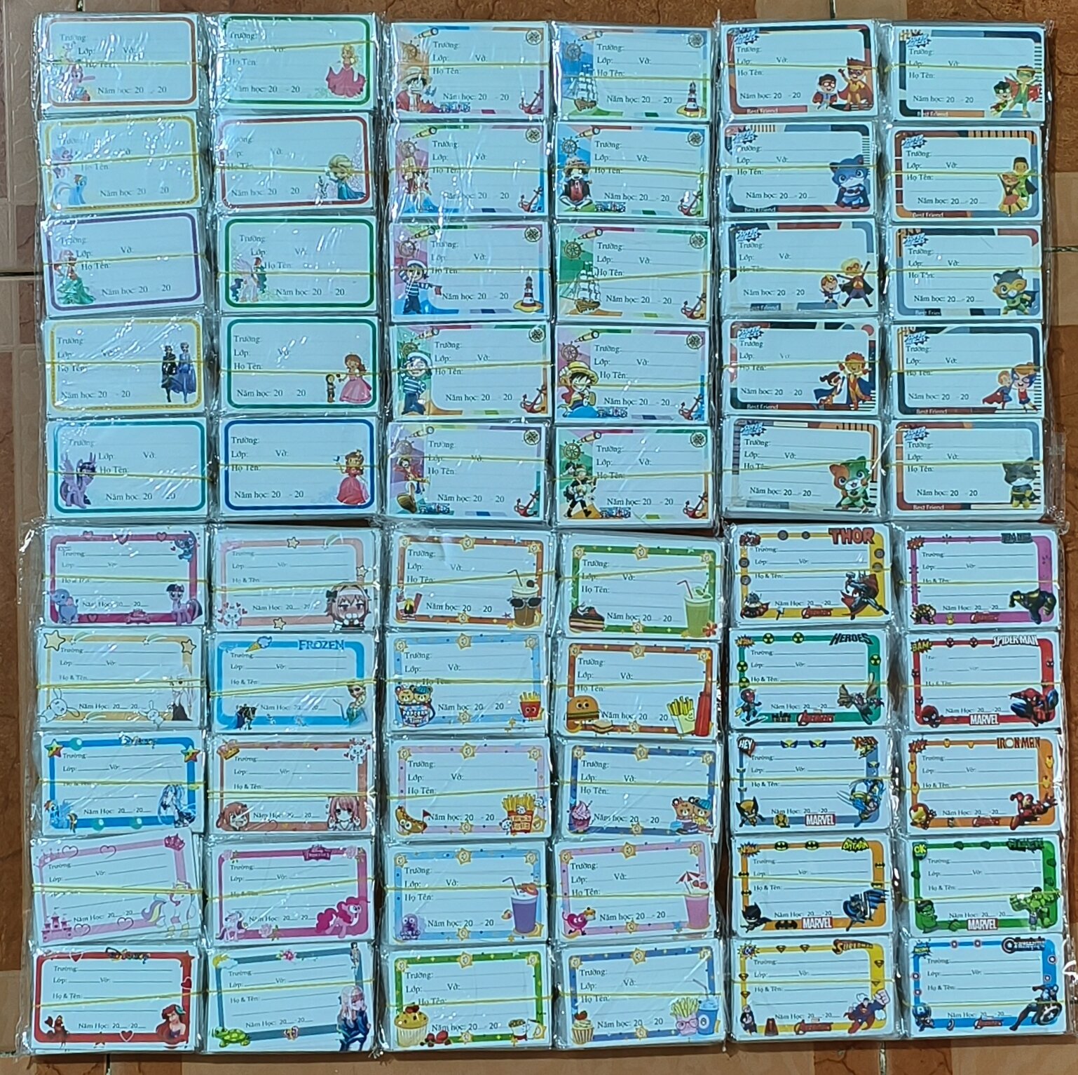 Combo 100 nhãn vở hoạt hình có keo dán sẵn