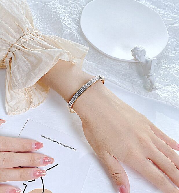 Vòng tay titan 3 hàng xoàn (màu trắng/vàng/vàng hồng)