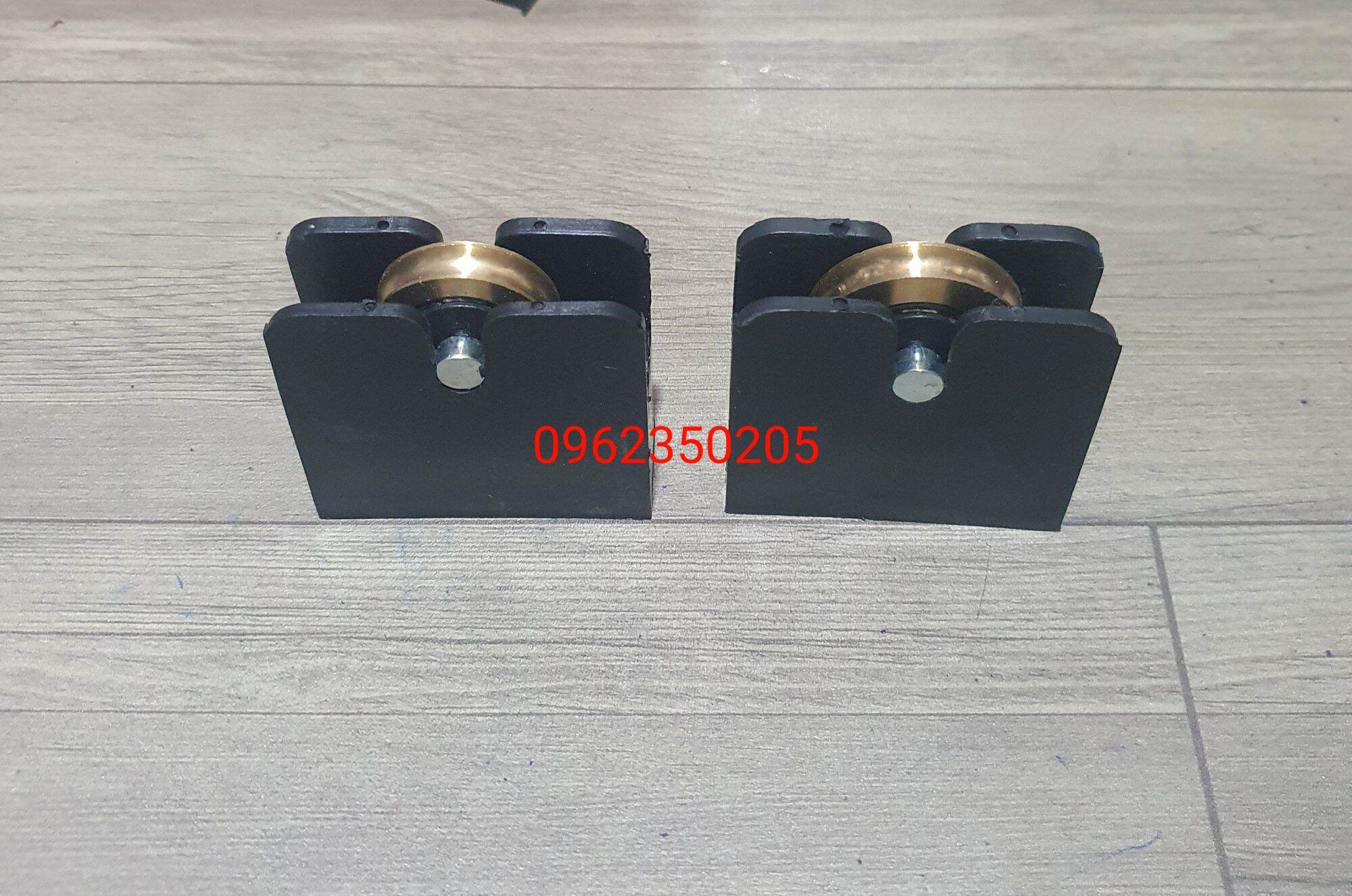 Bánh xe cửa đi lùa nhôm hệ 700 tốt / thường.