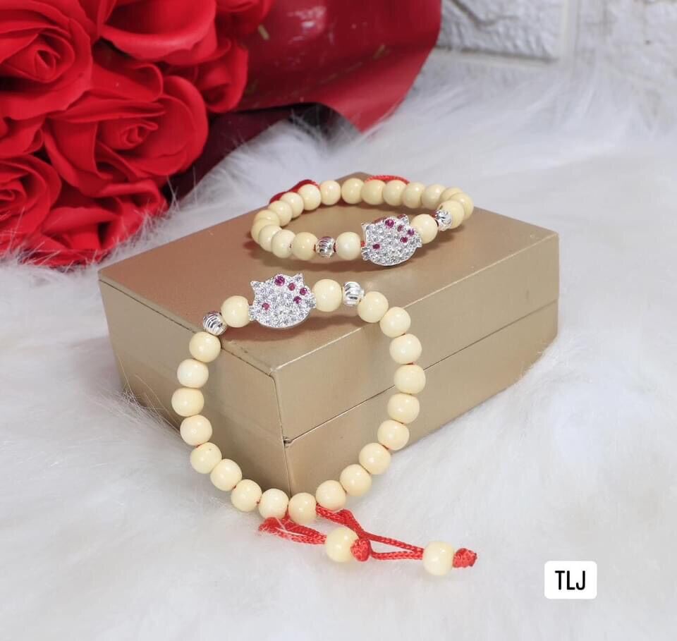 Vòng dâu tằm mix con giáp cho bé
