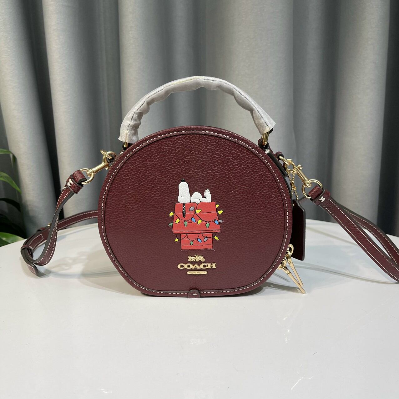 Túi coa**ch dáng tròn mini hoạ tiết xinh xắn