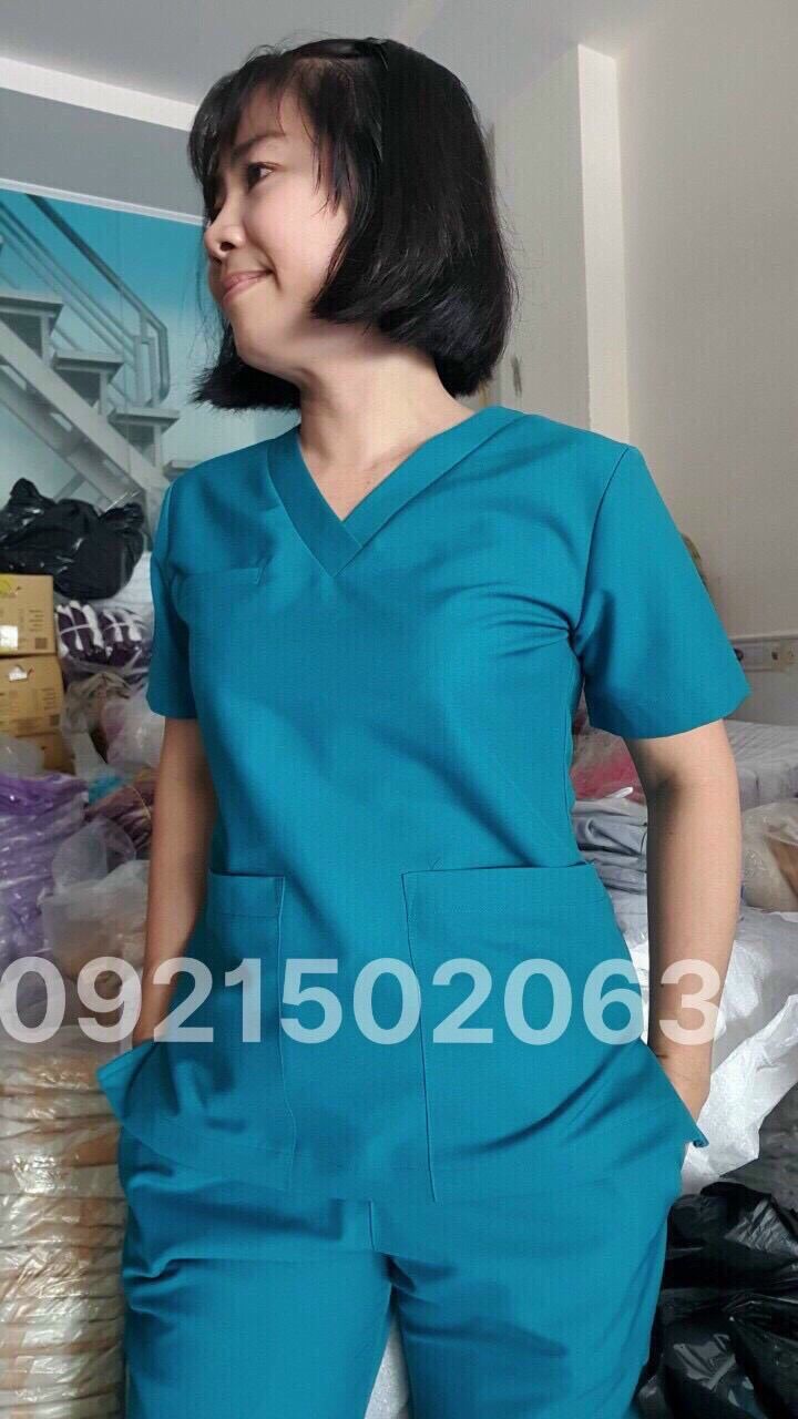 Đồng phục spa/nhân viên y tế màu xanh lý cotton lạnh chất lượng
