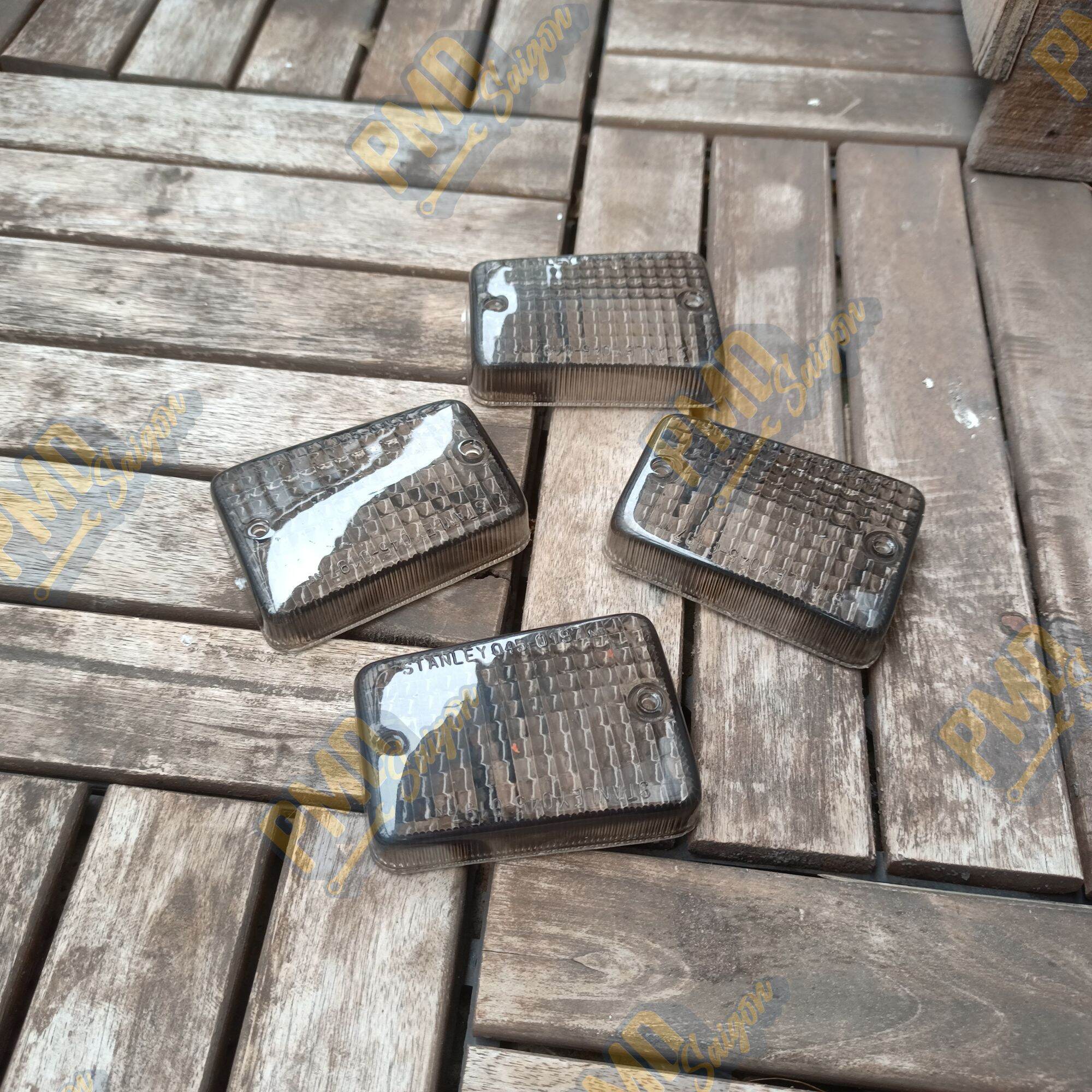 Bộ chụp đèn xi nhan khói và chụp đèn lái cái cub 82-dd đời cũ