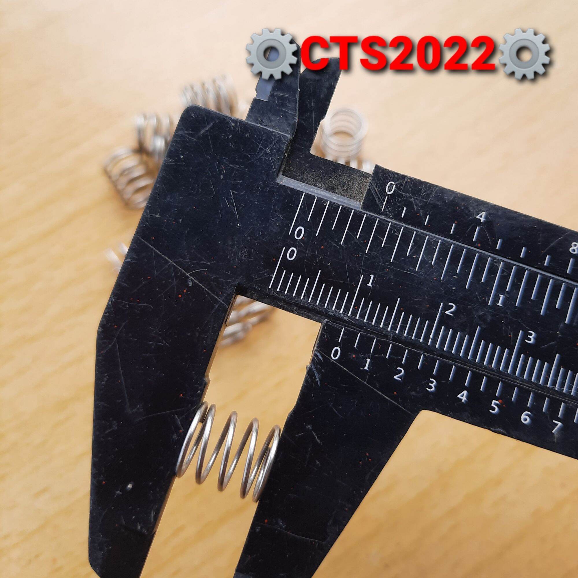 Lò xo nén inox phi 9mm sợi 0.5mm dài 10mm