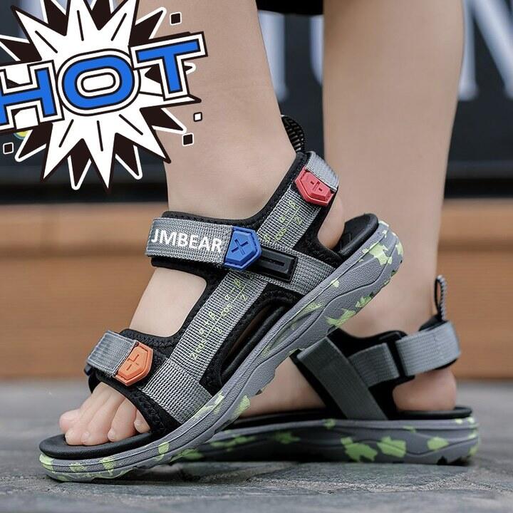 Xăng đan bé gái xăng đan trẻ em chống trượt thoáng khí mẫu mới mùa hè xăng đan công chúa học sinh tiểu học giày đi biển chịu mài mòn bé gái