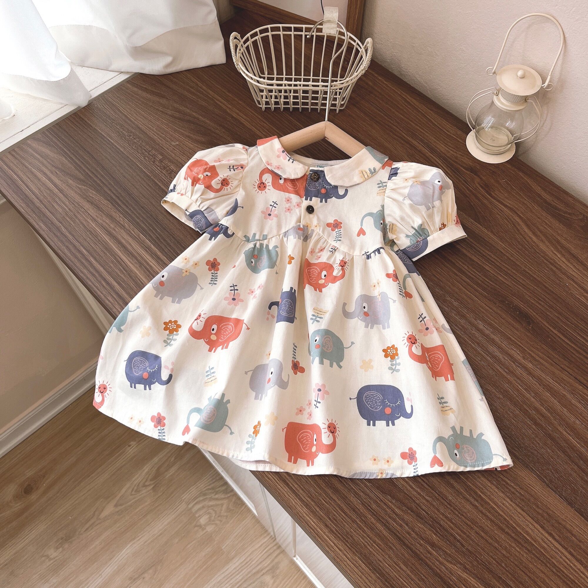 Váy bé gái (8-26kg) cổ sen eo cong - họa tiết