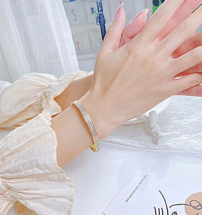 Vòng tay titan 3 hàng xoàn (màu trắng/vàng/vàng hồng)
