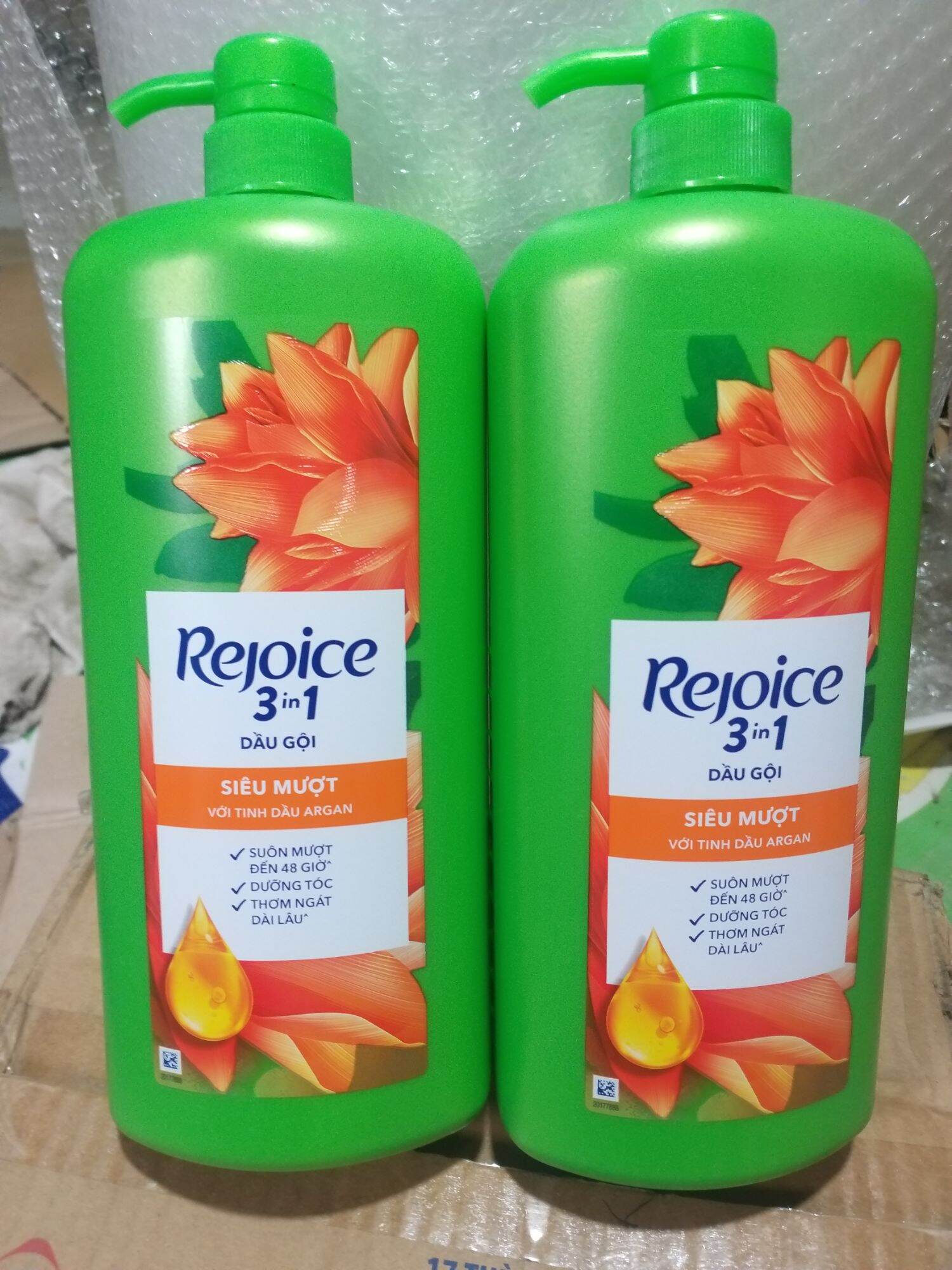 Dầu gội REJOICE 1,2L (1,35kg)  Siêu mềm mượt