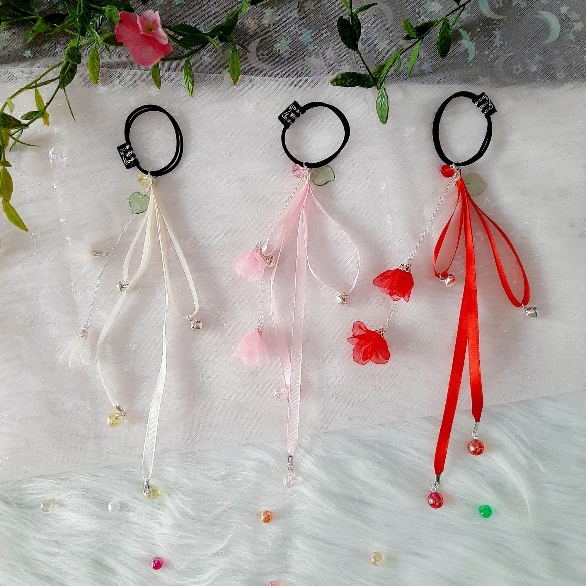 Cột tóc hoa rơi đính ngọc