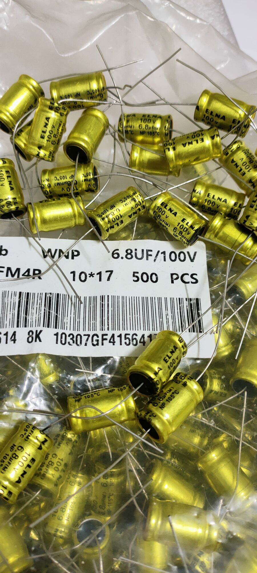 10 Tụ loa 2 đầu 6.8uf 100v màu vàng