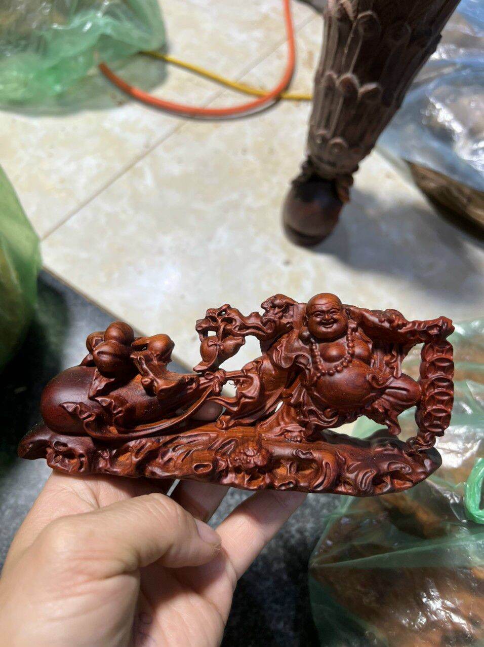 Tượng phật di lặc kéo bao tiền ,bằng gỗ trắc đỏ đen kt 15×7×4cm