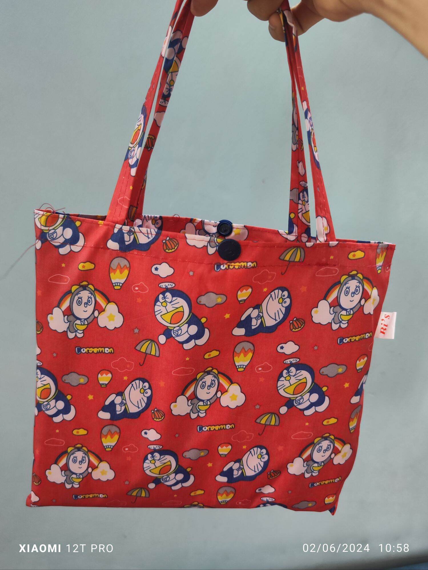 Áo mưa bít vải dù hình thú DORAEMON dễ thương