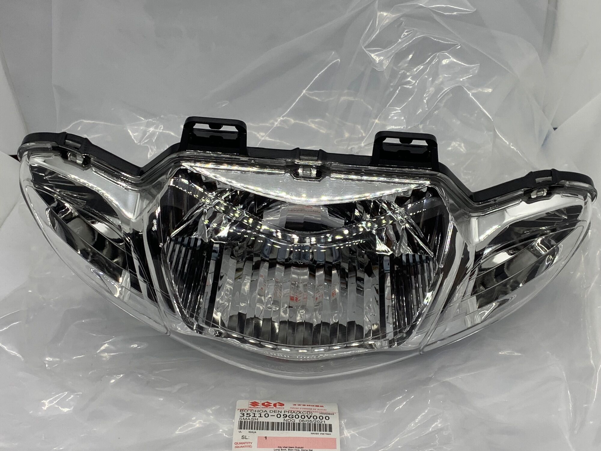 Pha đèn smash 110 suzuki