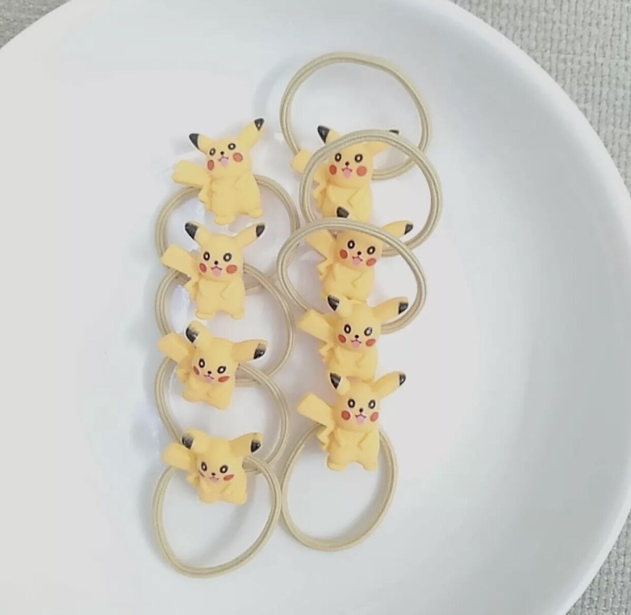 Sỉ _ 100 dây cột tóc hình picachu nhỏ