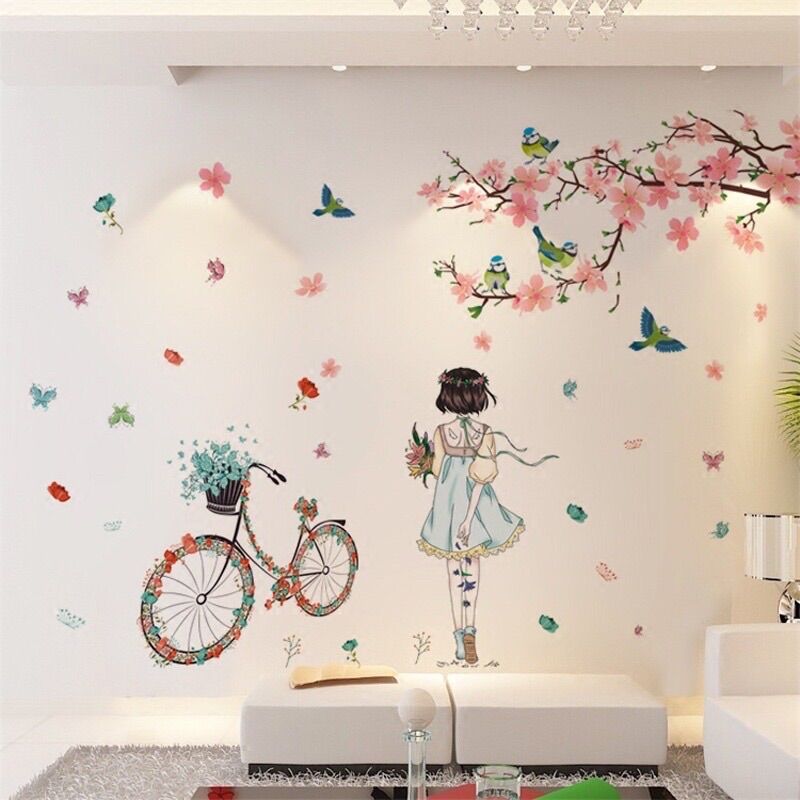 Decal dán tường cô gái xe đạp và hoa đào