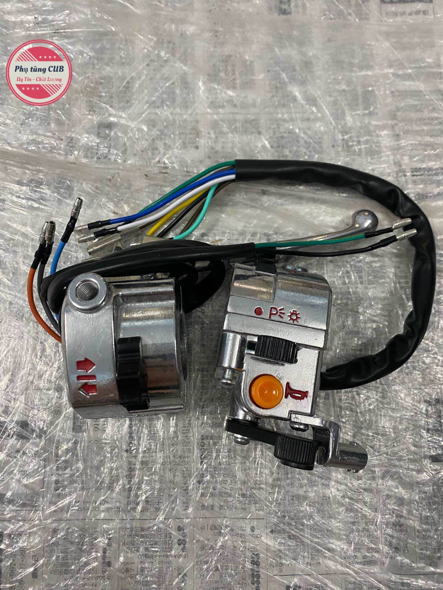 Bộ cùm công tắc xe CUB 82-Dd