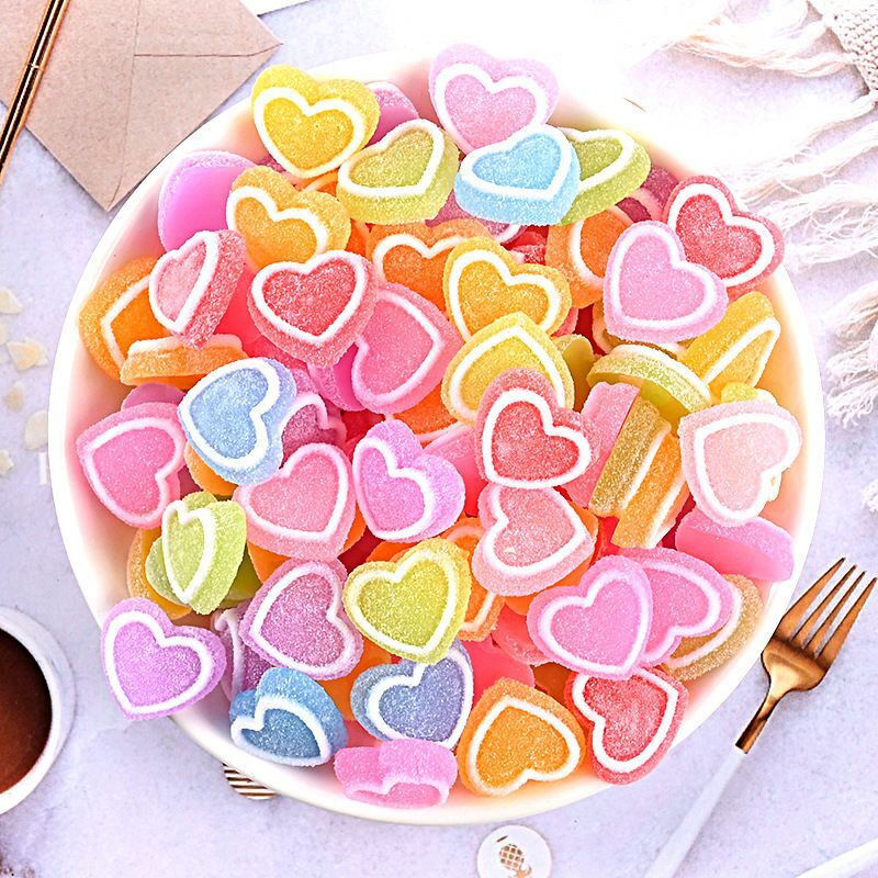 Charm điện thoại mẫu kẹo tim trắng