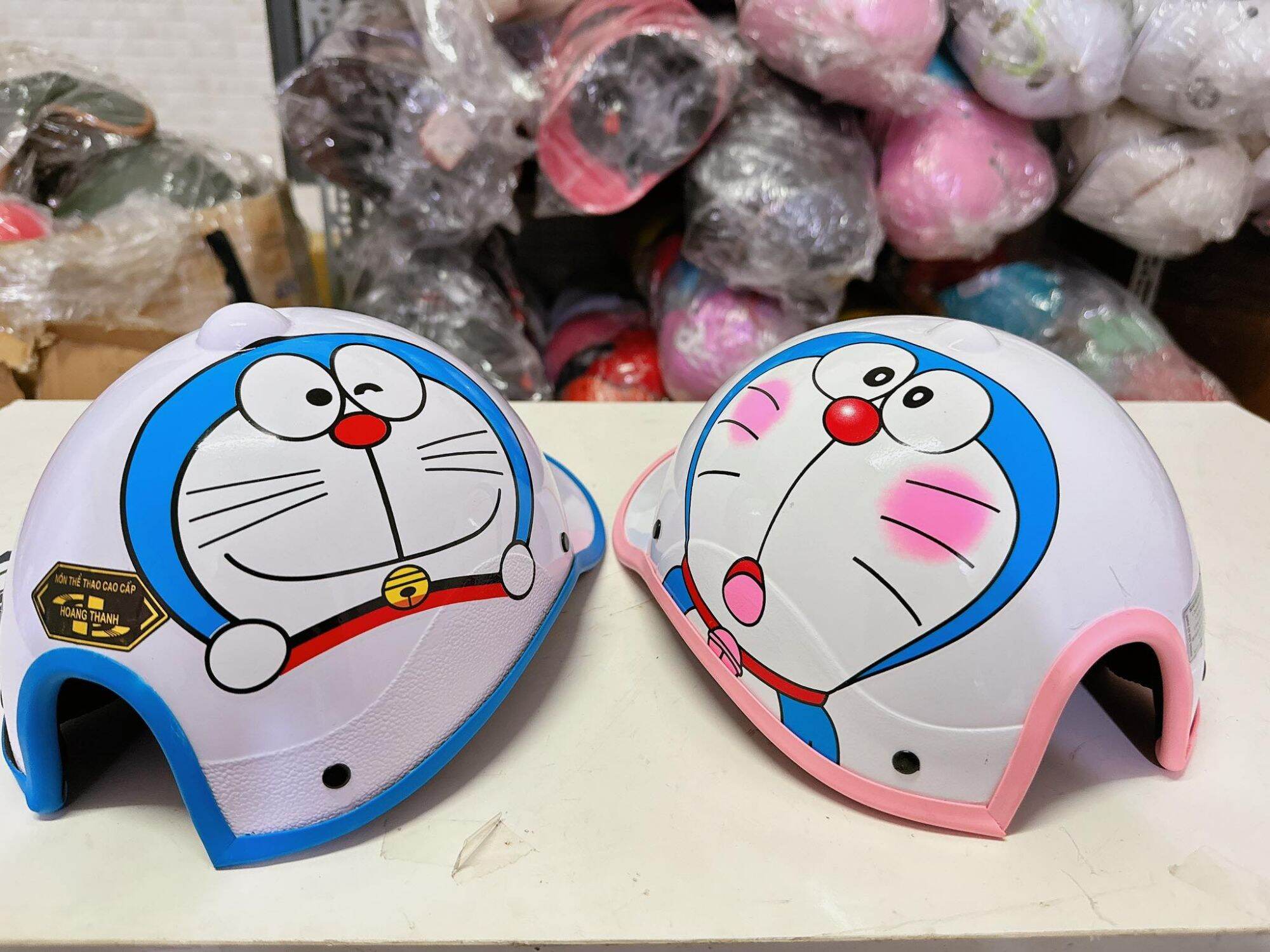mũ bảo hiểm gấu dâu doremon lưỡi trai ( nón kết nữ )
