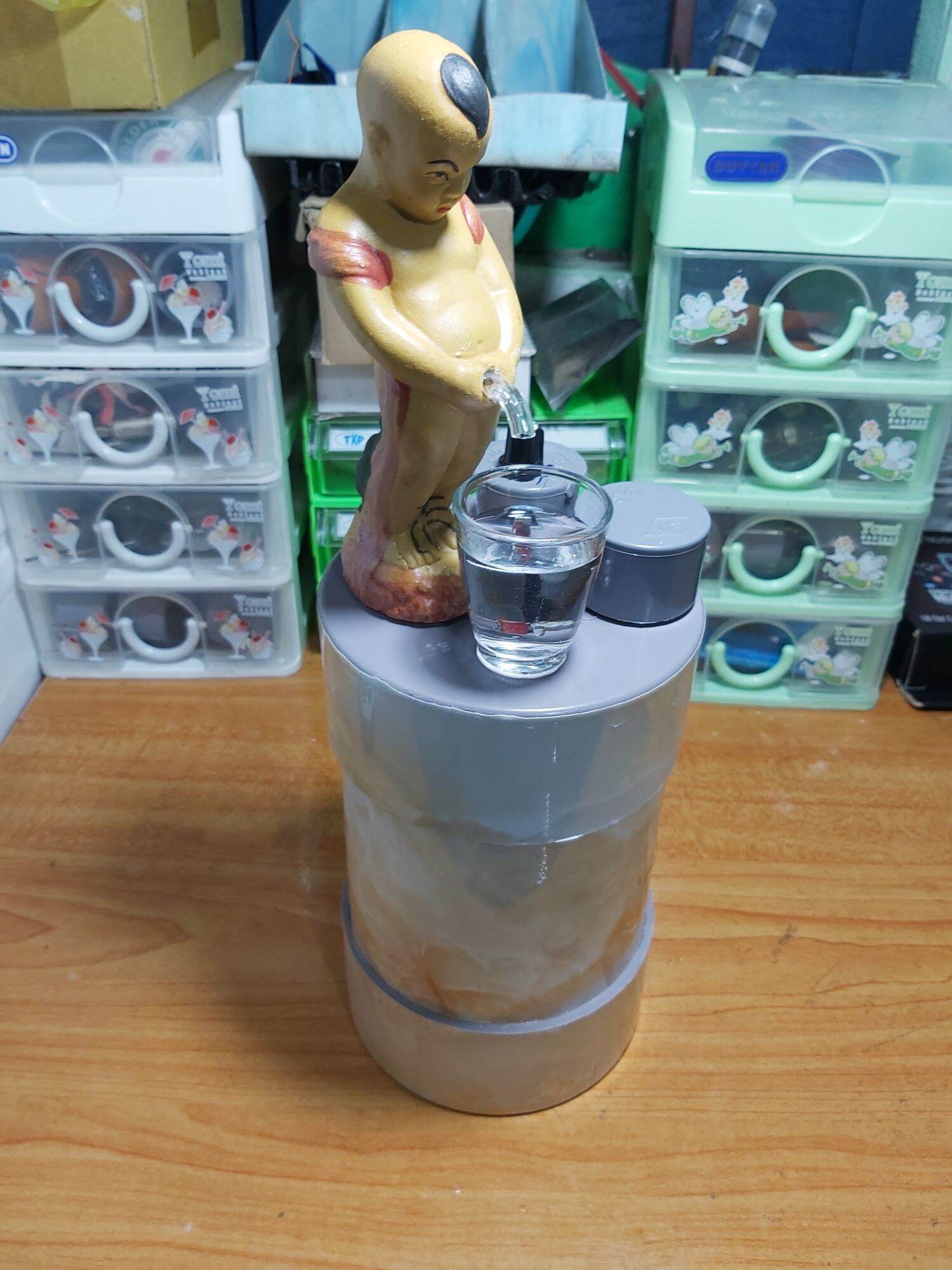Bình đựng rót rượuu tự động chú tiểu