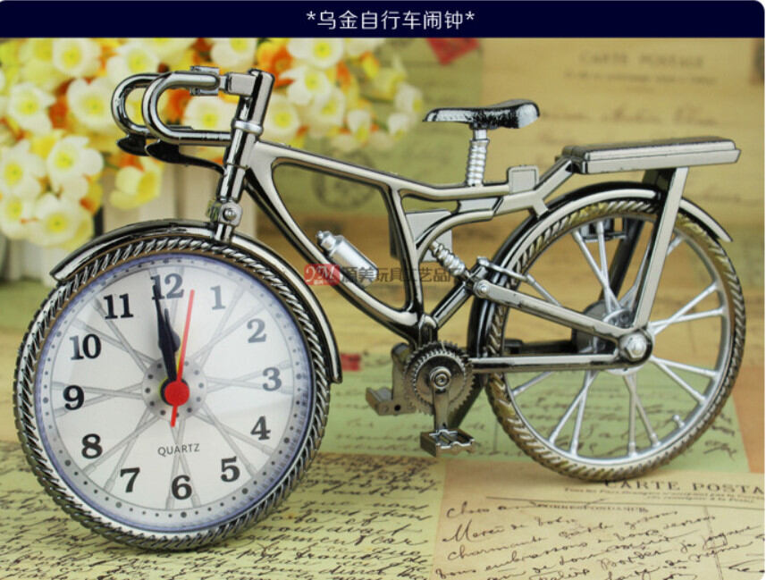 ĐỒNG HỒ BÁO THỨC ĐỂ BÀN HÌNH XE ĐẠP