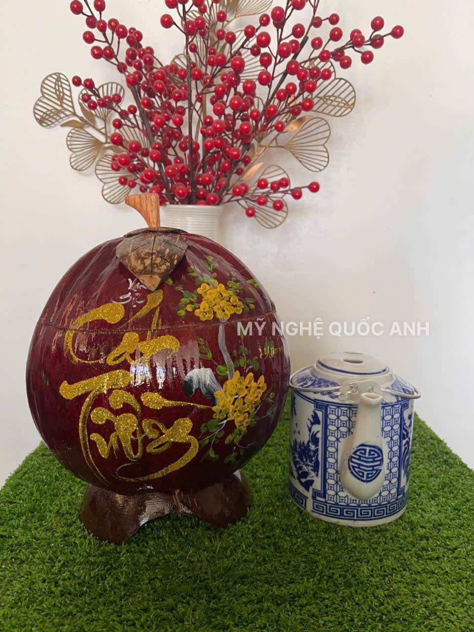 Vỏ dừa ủ ấm trà giử nhiệt vẽ thư pháp