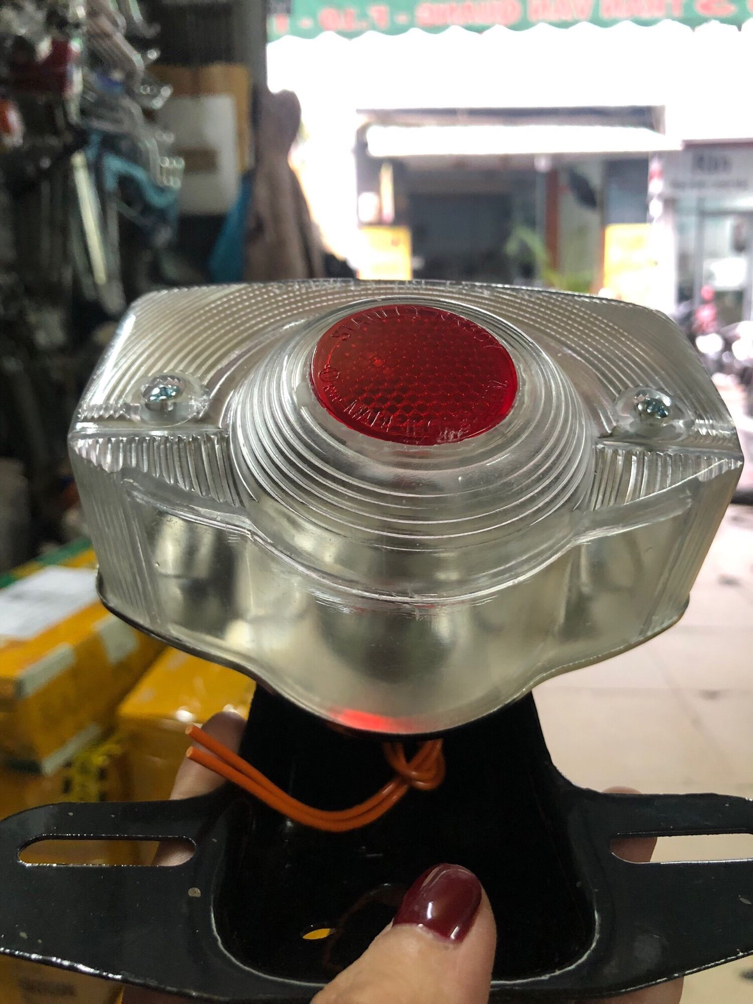 Đèn lái CD chụp trắng đồng tiền đỏ