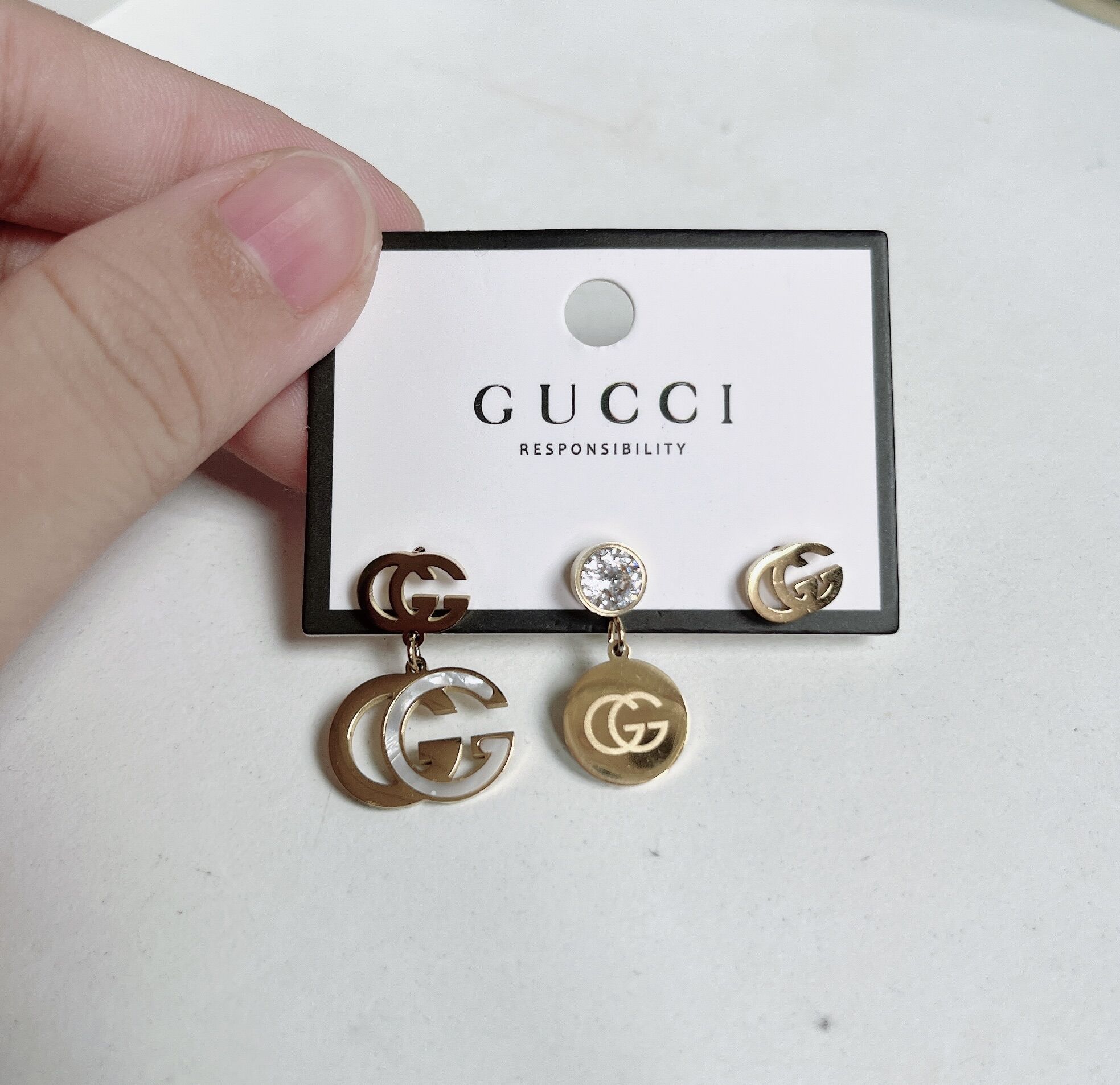 Set bông tai titan gucci 3 bông cách điệu