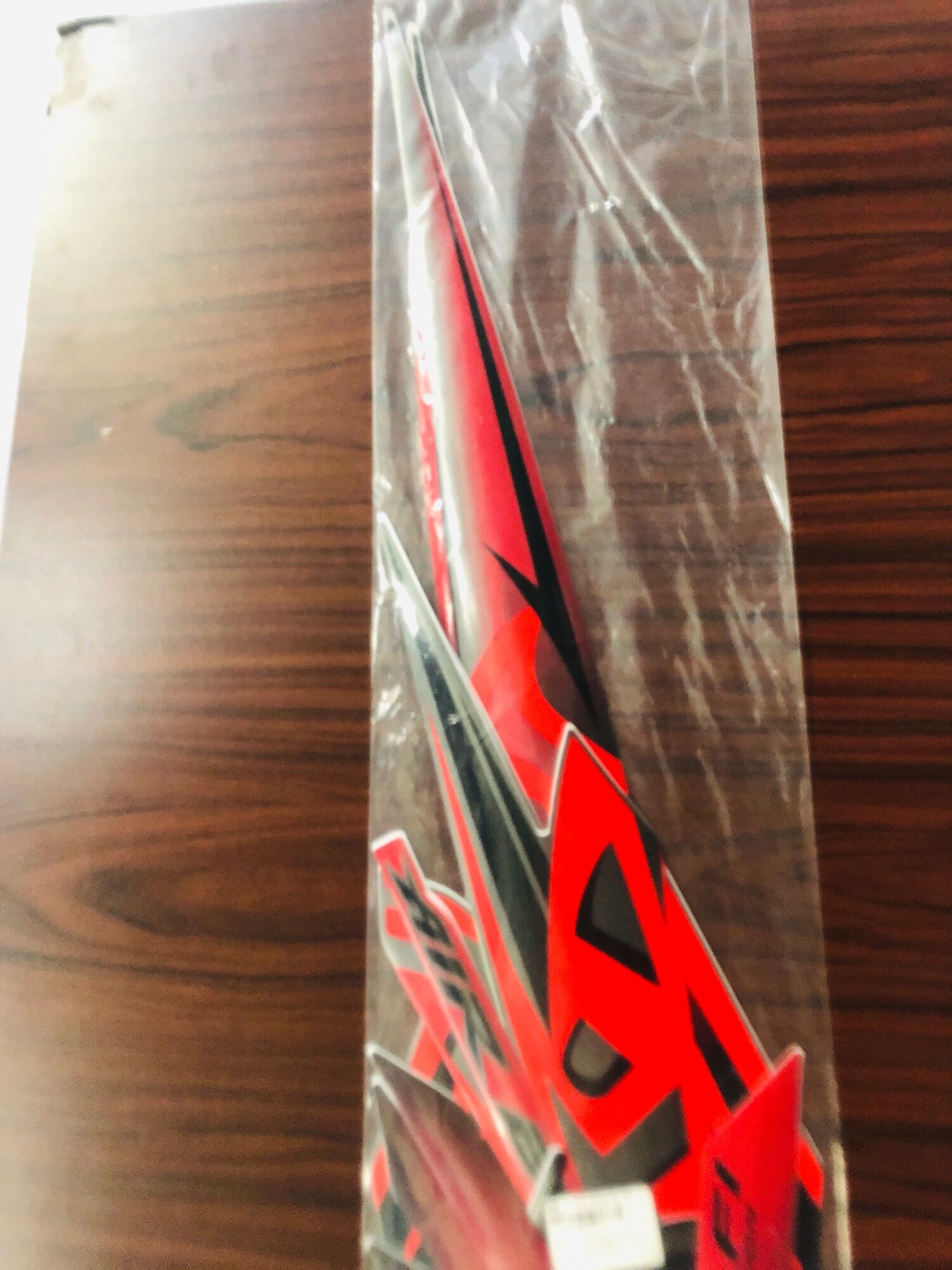 TEM AIRBLADE 2011 ĐỎ ĐEN 3LTP