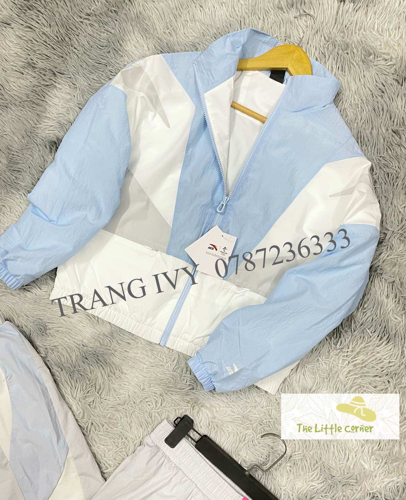 Bộ thể thao gió nữ Anta