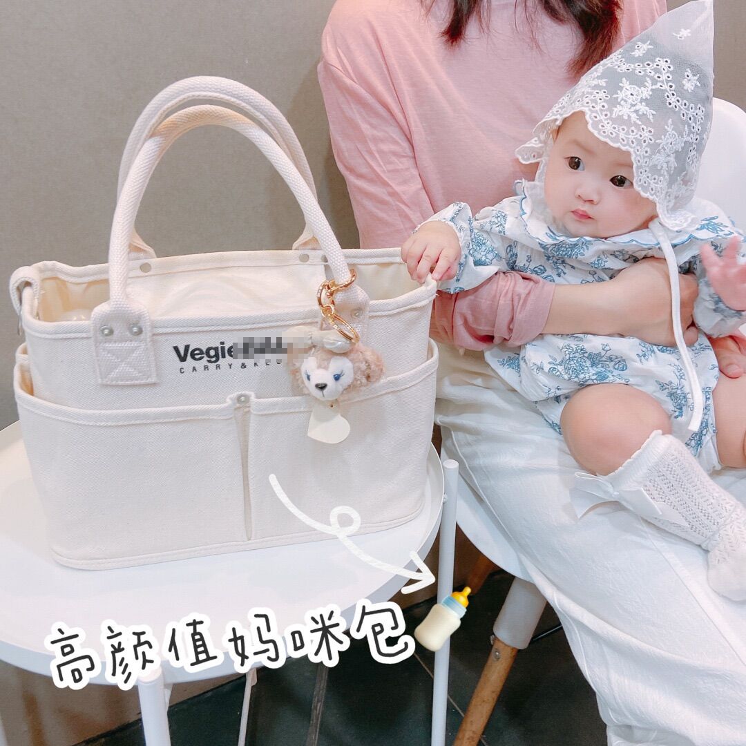 Túi bĩm sữa mẹ và bé size to