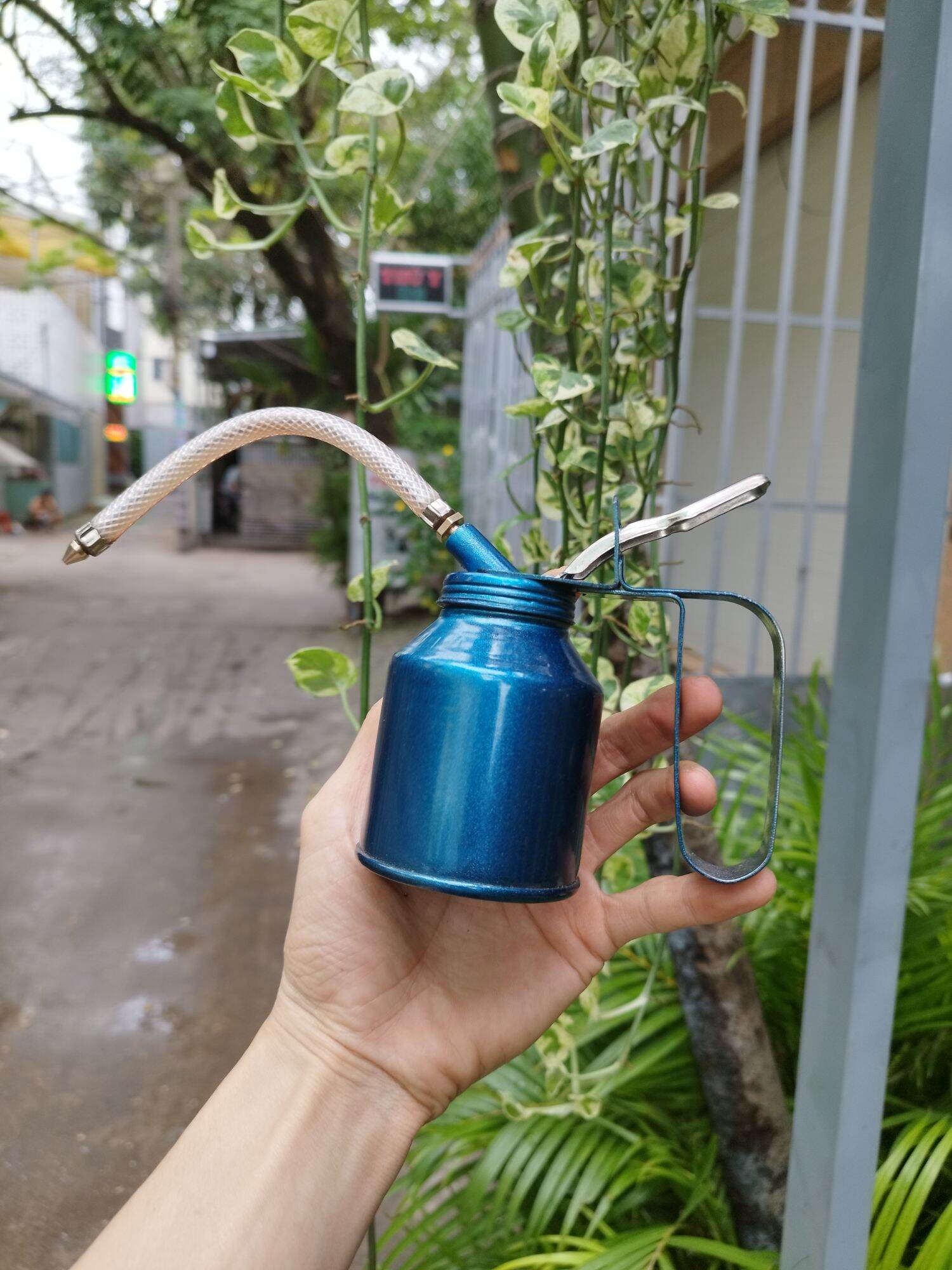 bình châm nhớt sắt