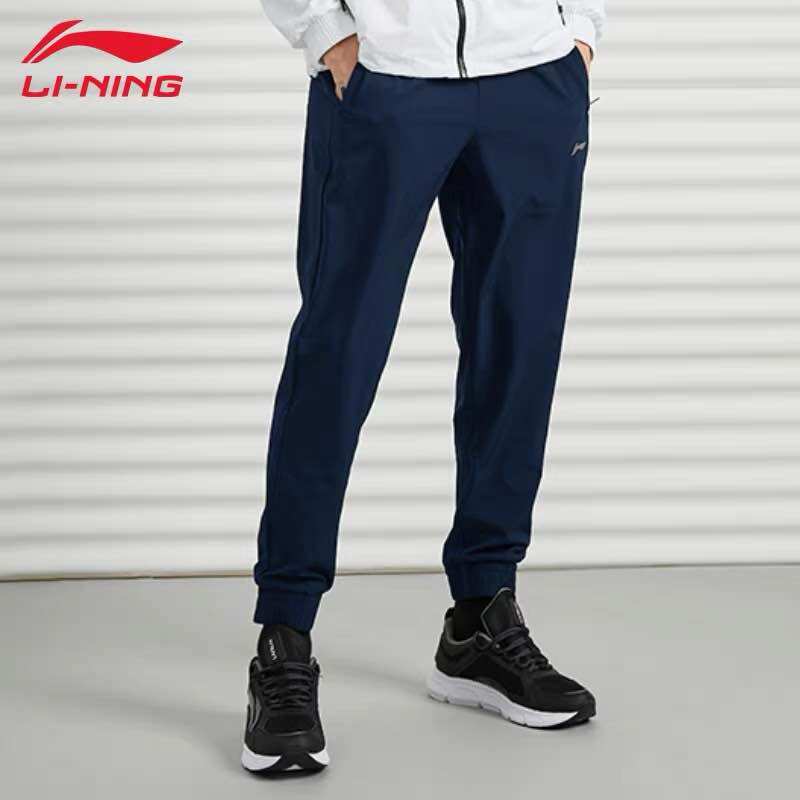 Quần gió nam Lining AYKR859
