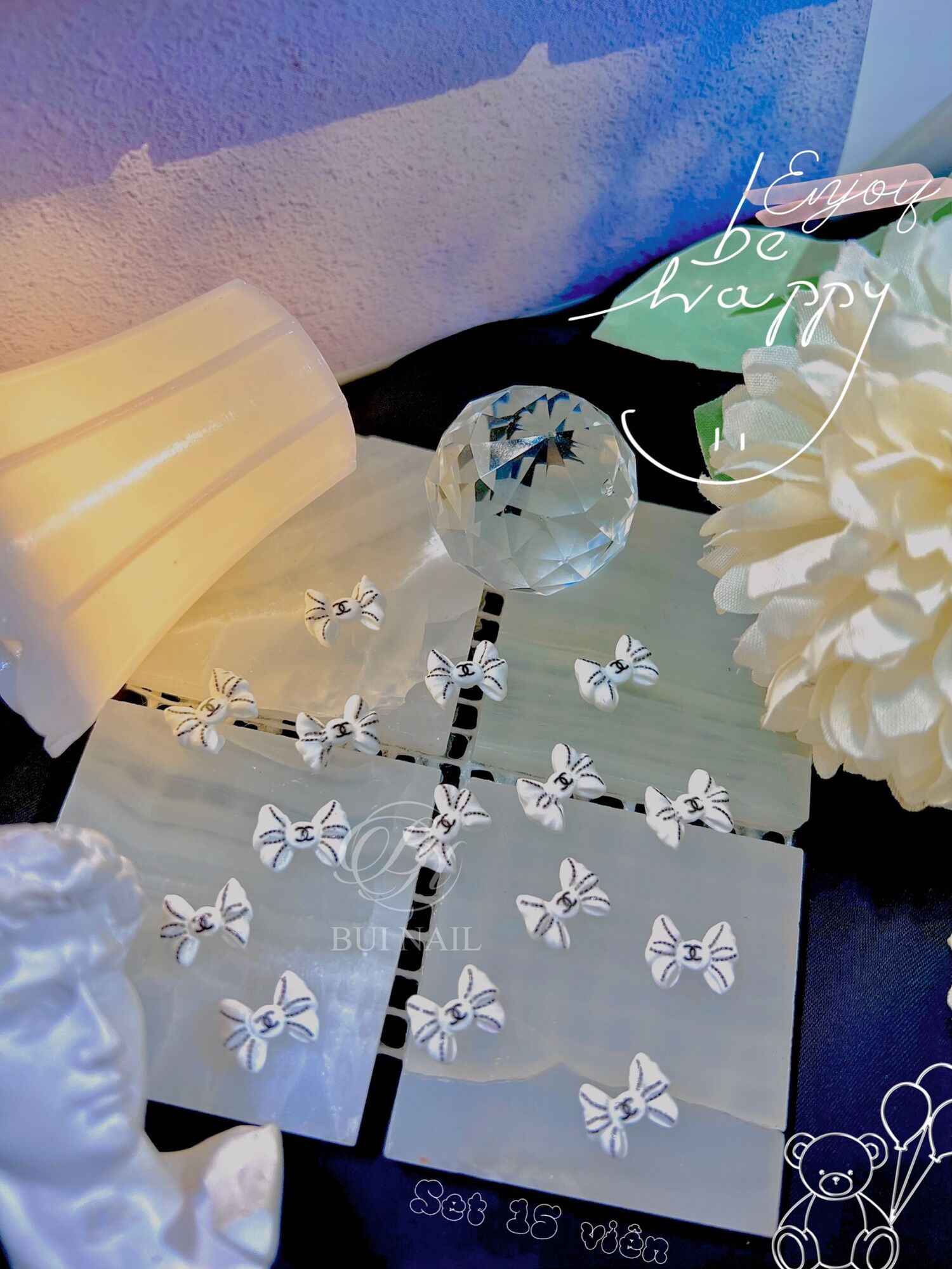 Charm nơ cha neo trắng 15viên