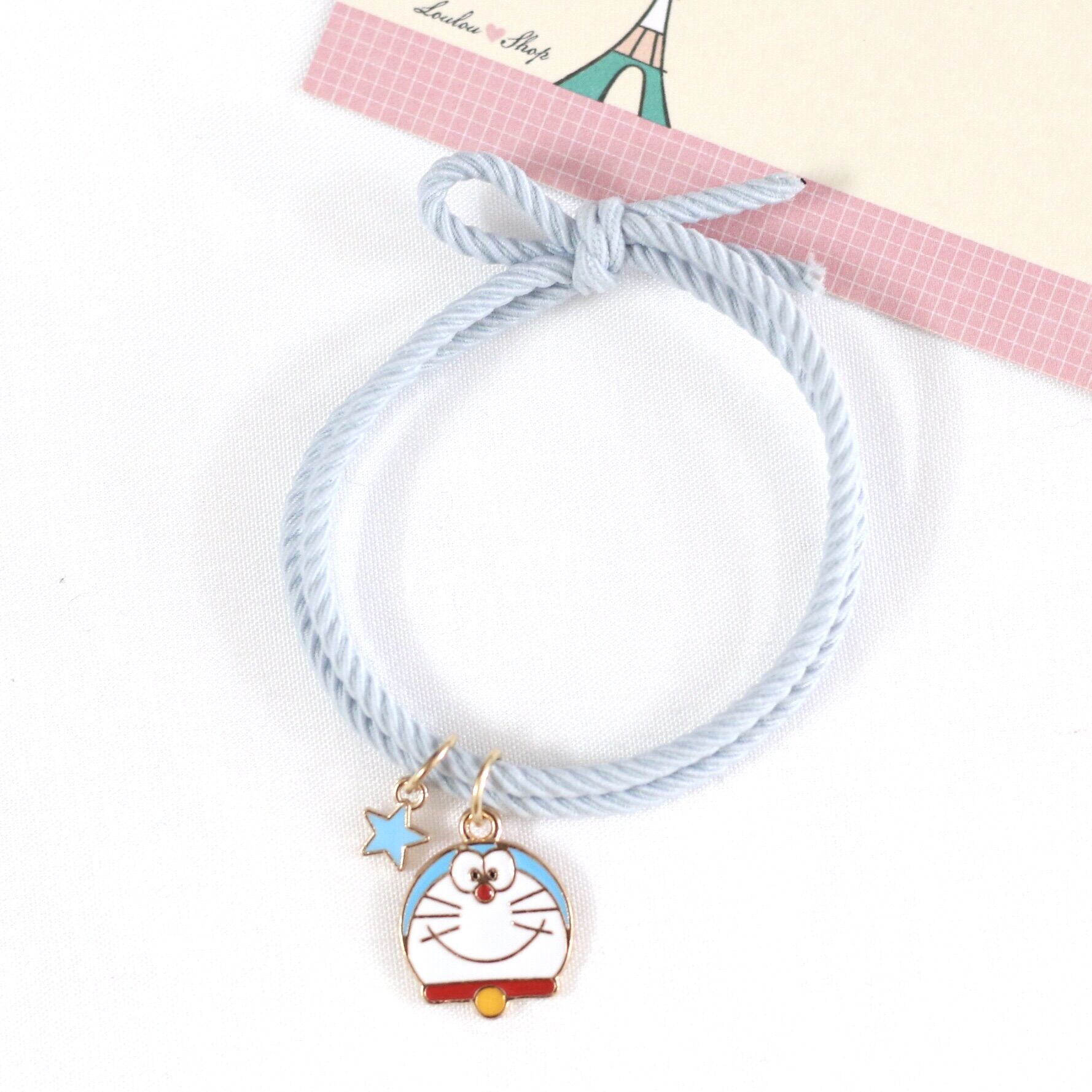 Combo 2 Dây Thun Buộc Tóc Mon + Chuông/Vòng Tay Doremon Doraemon
